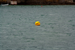 Harbour bouy with the words Fairway on it